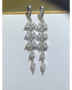 Elegant 6 Carat Drop Earrings with multiple pear-shaped clear stones in silver setting