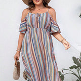 Trendsi striped cold shoulder midi dress with short sleeves and flowy skirt worn with hat and woven handbag