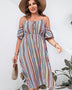 Trendsi striped cold shoulder midi dress with short sleeves and flowy skirt worn with hat and woven handbag