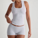 White ribbed tank top and shorts set on display for a casual summer look
