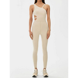 Beige asymmetrical neck activewear jumpsuit for women by Babe Beachwear with side cutouts