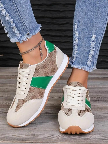 Trendsi affordable summer flat sneakers in beige with green accents and white sole worn with distressed jeans