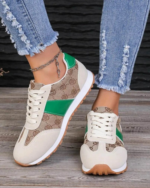 Trendsi affordable summer flat sneakers in beige with green accents and white sole worn with distressed jeans
