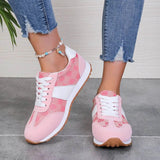 Trendsi pink affordable summer flat sneakers with white laces and gum soles worn with blue jeans