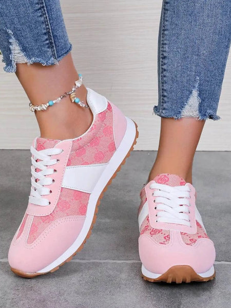 Trendsi pink affordable summer flat sneakers with white laces and gum soles worn with blue jeans