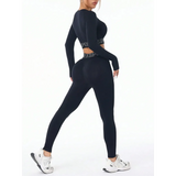 Trendsi black branded leggings and tank outfit active set worn by model with white sneakers