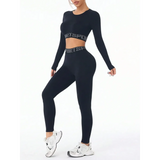 Trendsi active set featuring black branded leggings and tank outfit with long sleeves and white sneakers