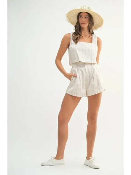 Woman wearing White Beach Summer Crop top Short set with hat and white sneakers