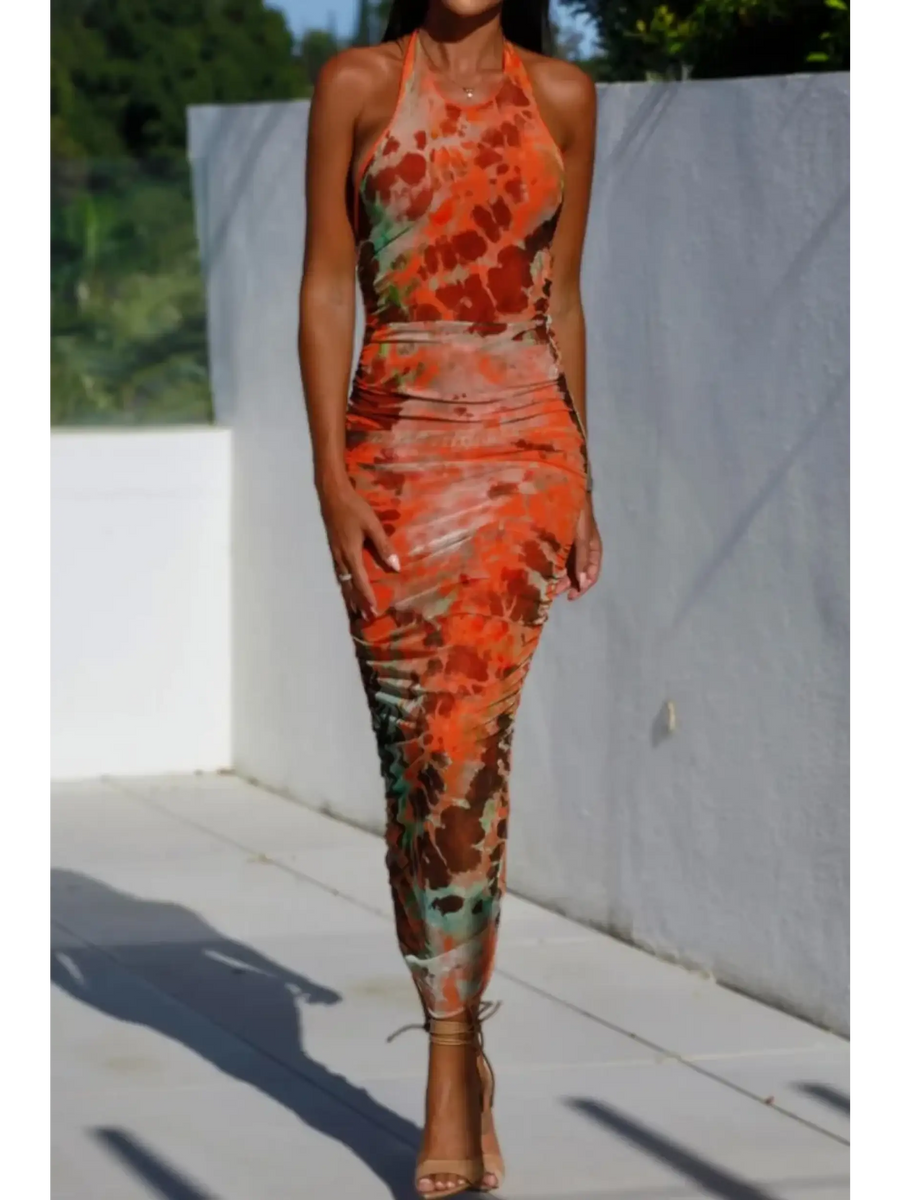 Trendsi backless halter dress midi length with orange and brown tie-dye pattern and fitted silhouette