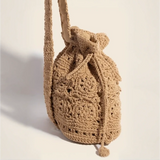 Crochet knit shoulder boho bag with intricate braided drawstring for beach vibes