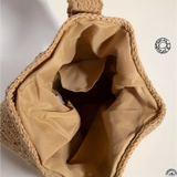 Open tan woven crochet knit shoulder boho bag showing intricate braided details for beach vibes