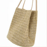 Woven straw tote with handles perfect for beach days stylish straw totes accessory