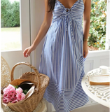  blue and white striped beach midi dress with spaghetti straps and tie front detail