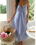  blue and white striped beach midi dress with spaghetti straps and tie front detail