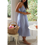 side view blue and white striped beach midi dress with spaghetti straps and flowy skirt