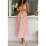 Trendsi striped peach and white sleeveless beach midi dress with a fitted bodice and flowy skirt