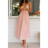 Trendsi striped orange and white beach midi dress with spaghetti straps and relaxed fit