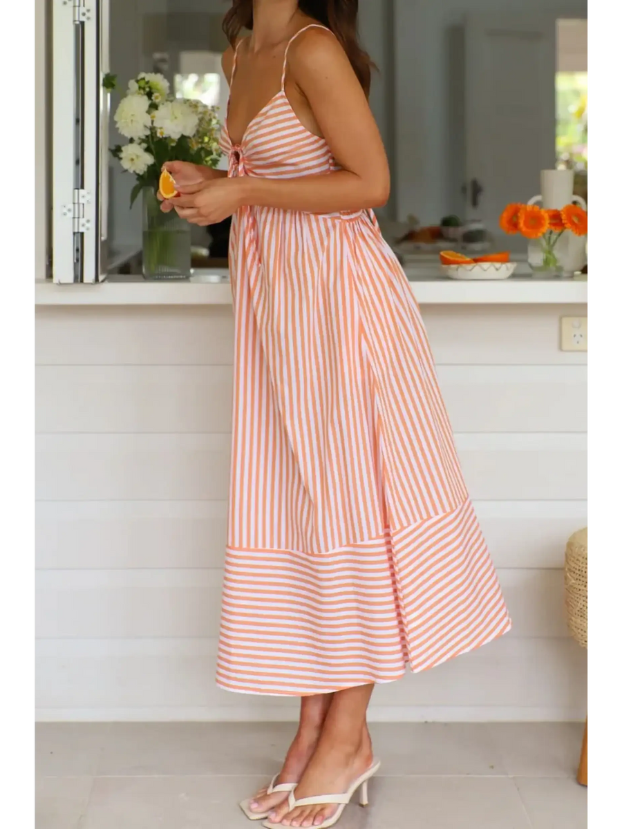 Trendsi beach midi dress with orange and white stripes worn with white heeled sandals