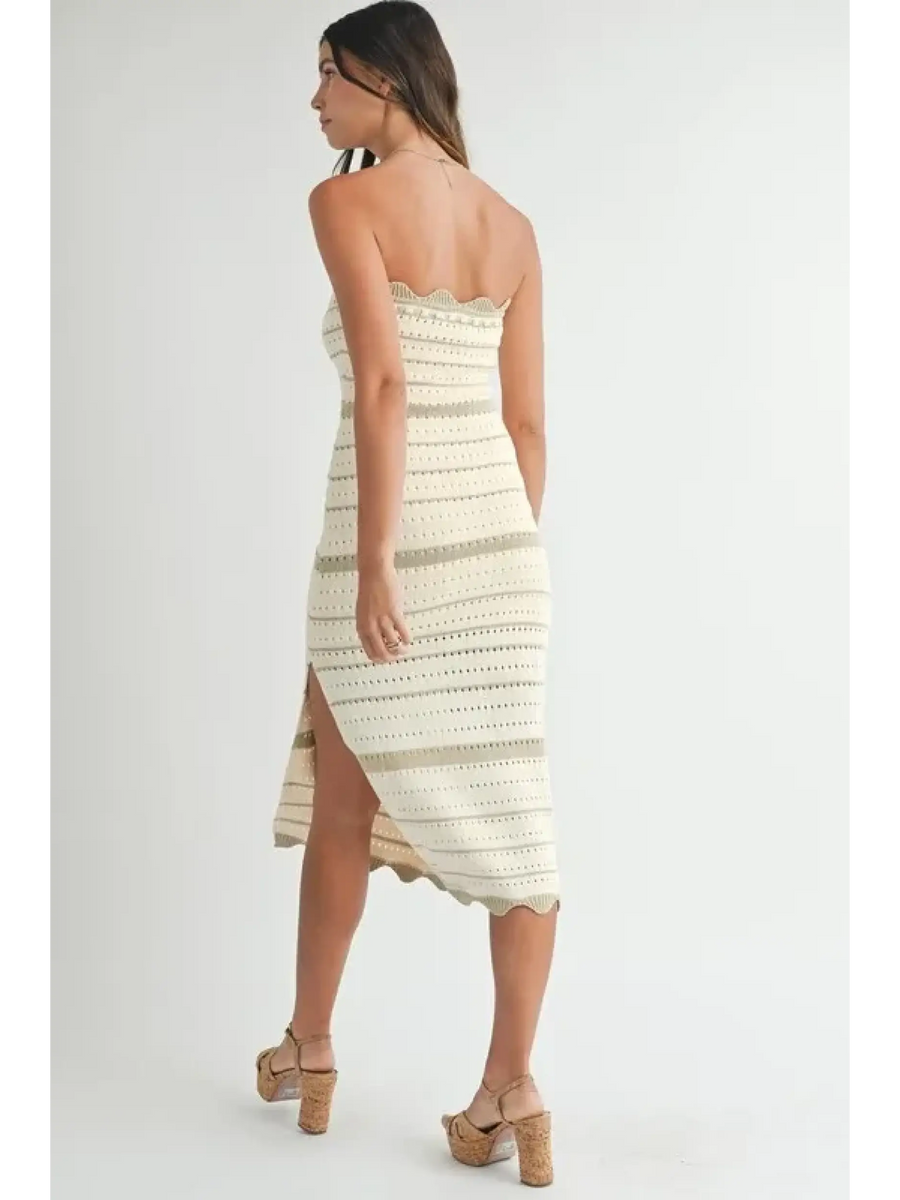 Beach Chic Beach Crochet Knit Slit Midi dress in cream worn by woman with side slit and strapless design