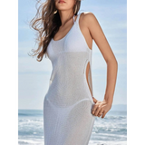 White delicate sheer swimsuit cover up by Babe Beachwear with side cutout detail at the beach