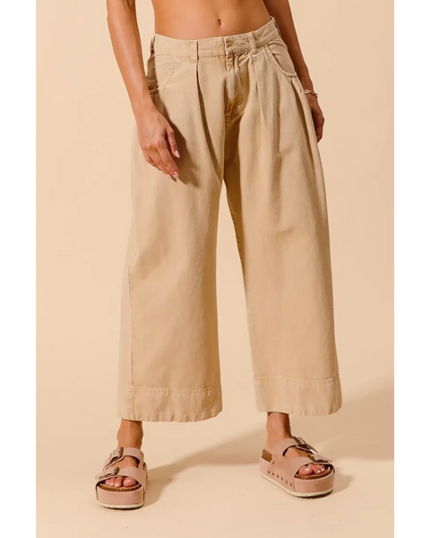 Babe Beachwear chic wide leg trousers for women in beige styled with platform sandals
