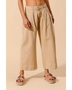 Babe Beachwear chic wide leg trousers for women in beige styled with platform sandals
