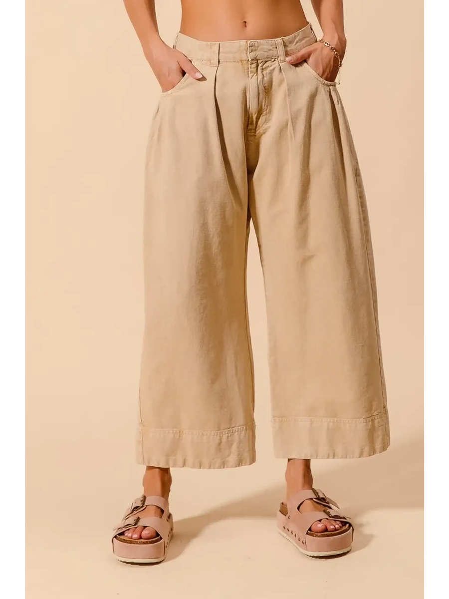 Beige chic wide leg trousers for women by Babe Beachwear styled with casual sandals