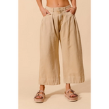 Beige chic wide leg trousers for women by Babe Beachwear styled with casual sandals