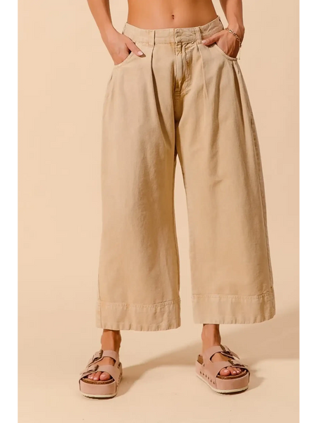 Beige chic wide leg trousers for women by Babe Beachwear styled with casual sandals