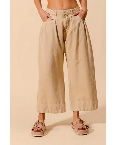 Beige chic wide leg trousers for women by Babe Beachwear styled with casual sandals