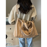 Babe Beachwaer lightweight Ladies duffle bag in beige corduroy fabric worn over shoulder