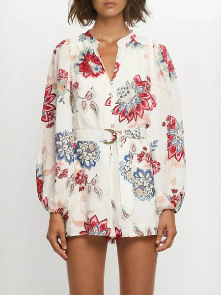 Babe Beachwear belted floral summer romper with long sleeves and colorful flower print