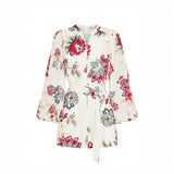 Babe Beachwear belted floral summer romper with long sleeves and multicolor flower print