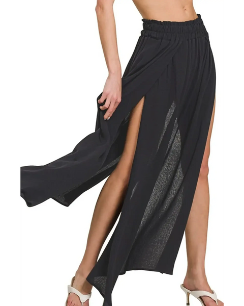 Trendsi black maxi skirt for resort wear with high slits and elastic waistband