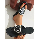 Babe Beachwear black pearl embellished sandals with decorative white pearls on straps