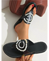 Babe Beachwear black pearl embellished sandals with decorative white pearls on straps