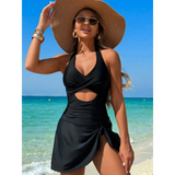 Beach Babes black sexy cutout swim dress with halter neck and side slit worn on the beach