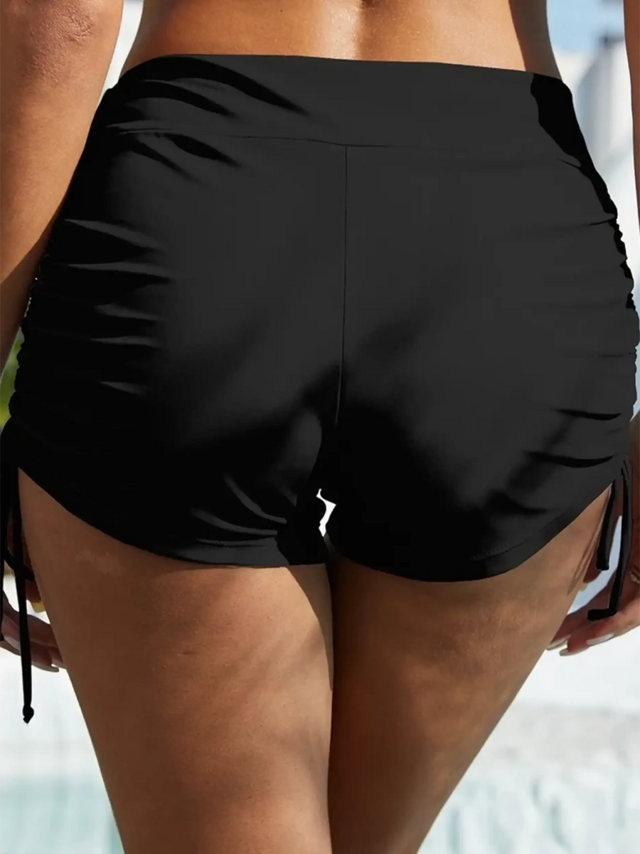 Beach Babes black swim shorts styled as tankini swim bottoms for women with ruched sides and adjustable ties