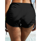 Beach Babes black swim shorts styled as tankini swim bottoms for women with ruched sides and adjustable ties