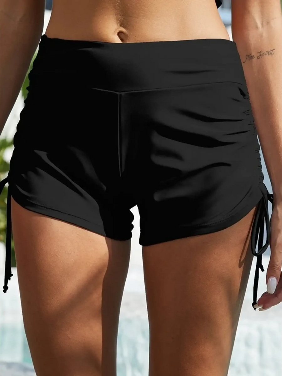 Beach Babes black swim shorts styled as tankini swim bottoms for women with side ties