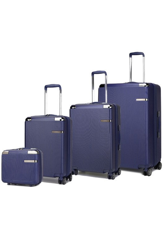 Rose Gold 4 piece travel suitcase set by Babe Beachwear with navy blue hard shell and telescopic handles