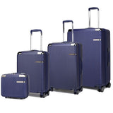 Rose Gold 4 piece travel suitcase set by Babe Beachwear with navy blue hard shell and telescopic handles