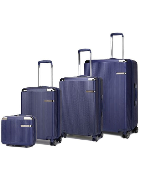 Rose Gold 4 piece travel suitcase set by Babe Beachwear with navy blue hard shell and telescopic handles