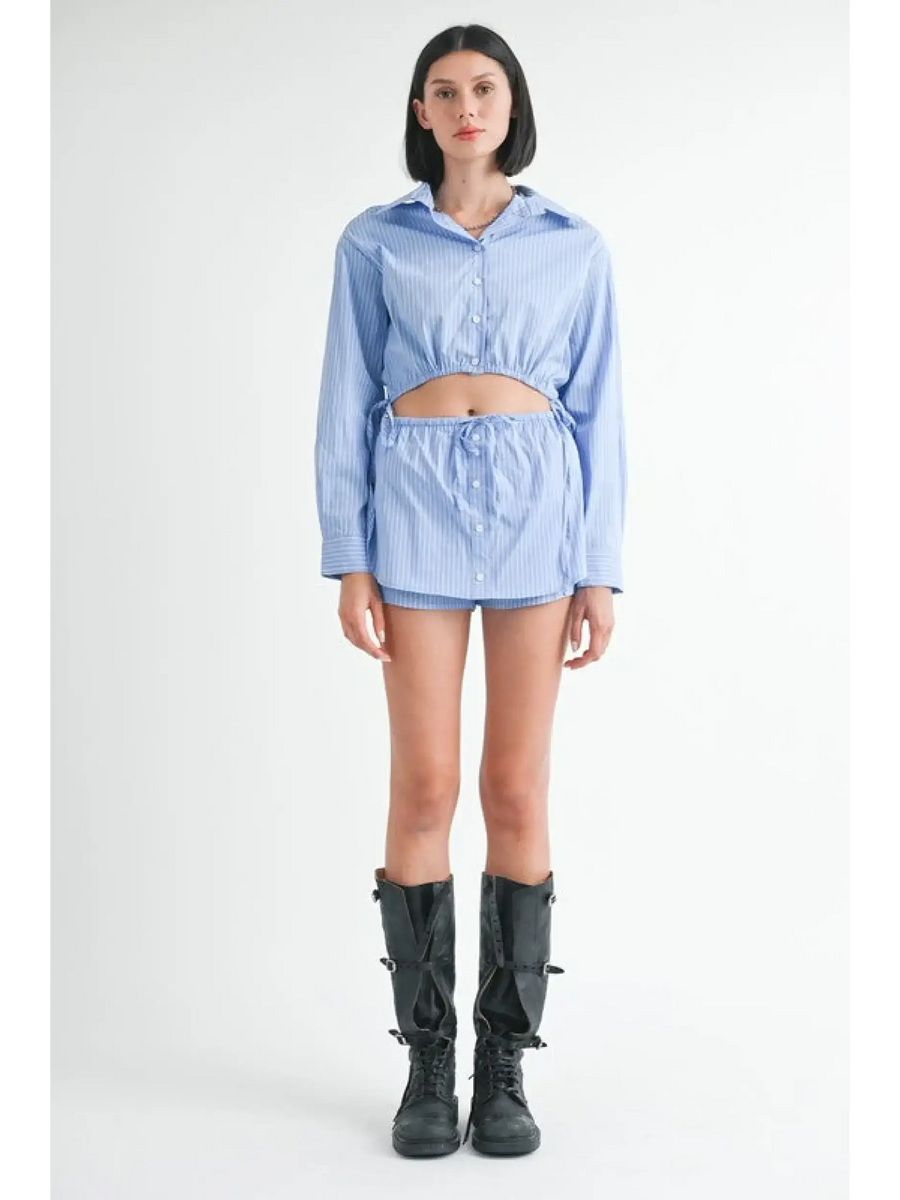 Emory Park blue and white cotton beach top with long sleeves and matching shorts worn with black boots