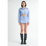 Emory Park blue and white cotton beach top with long sleeves and matching shorts worn with black boots