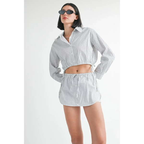 Emory Park blue and white cotton beach top with long sleeves and collar worn with matching shorts 