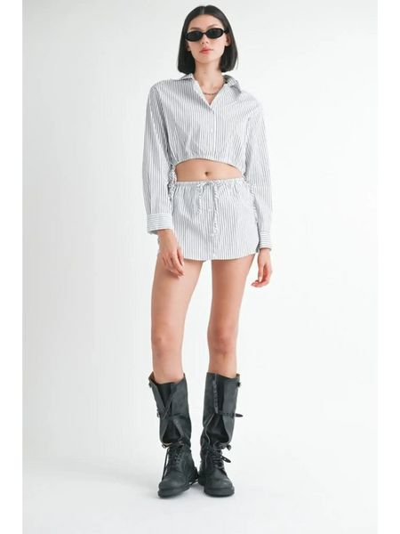 Emory Park blue and white cotton beach top with long sleeves styled with matching shorts and black boots