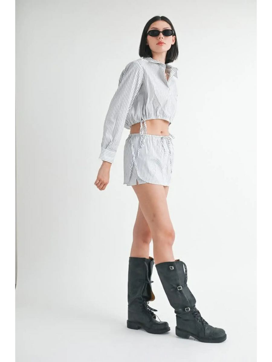Emory Park blue and white cotton beach top worn by model with matching shorts and black boots