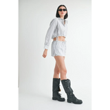 Emory Park blue and white cotton beach top worn by model with matching shorts and black boots