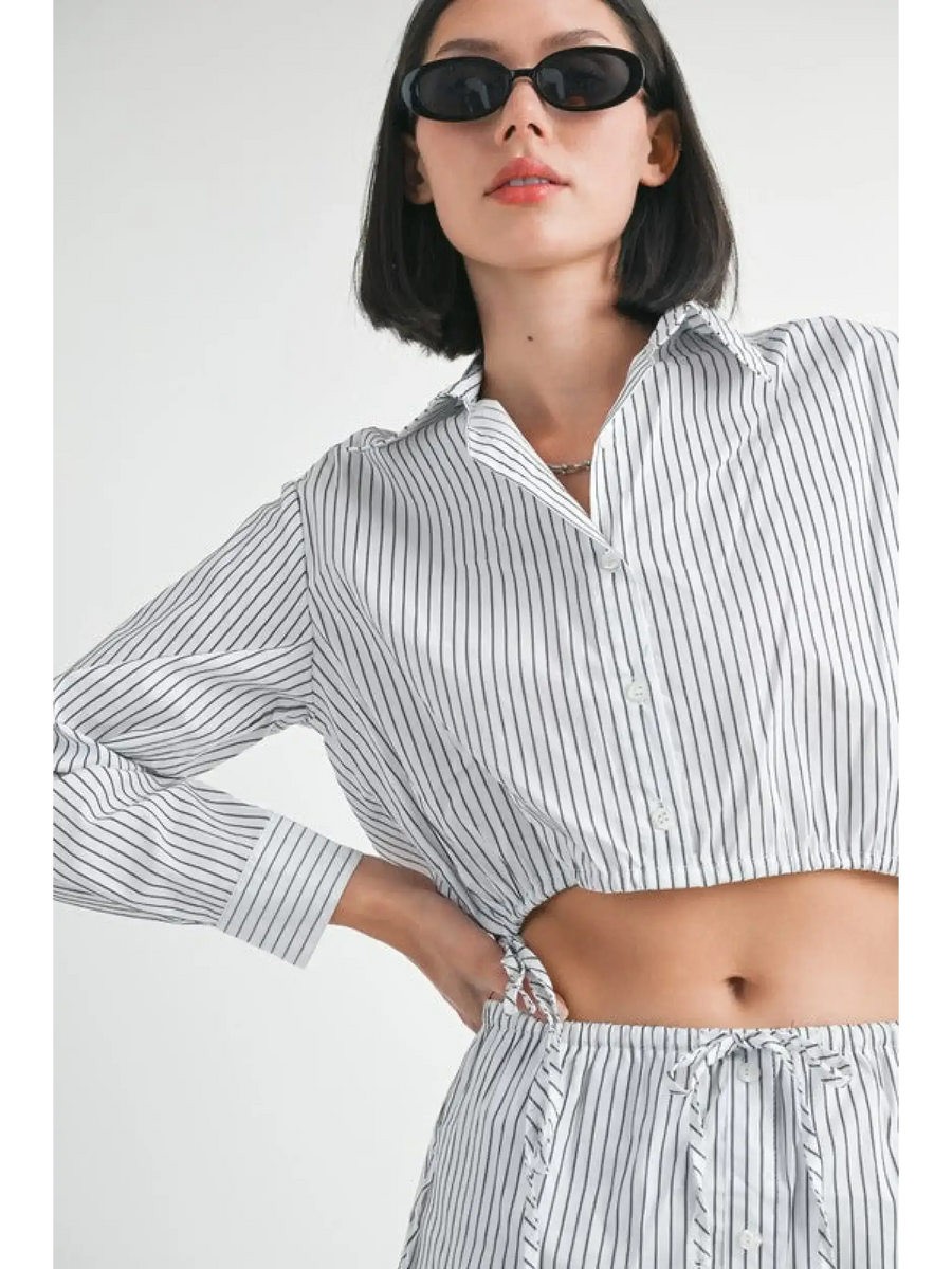 Emory Park blue and white cotton beach top with vertical stripes worn with matching bottoms